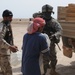 Soldiers Distribute Water and Food