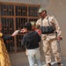 Soldiers Distribute Water and Food