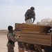 Soldiers Distribute Water and Food