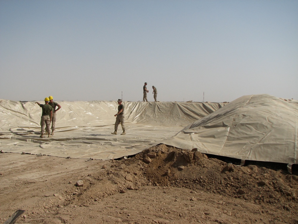 Marines construct fuel berm