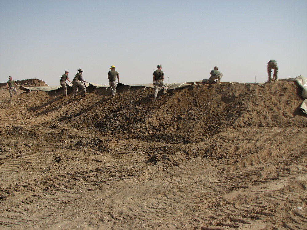 Marines construct fuel berm