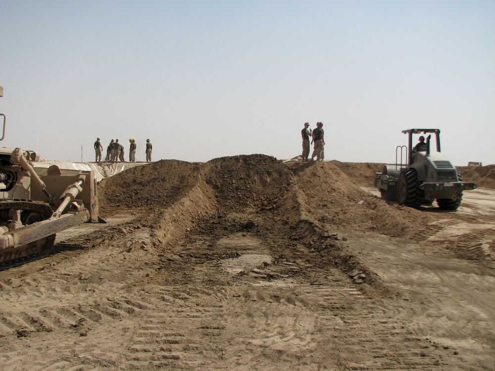 Marines construct fuel berm