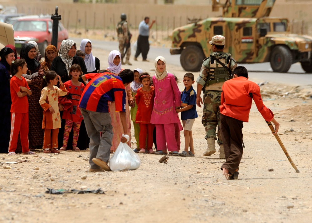 Iraqi children receive toys and school supplies