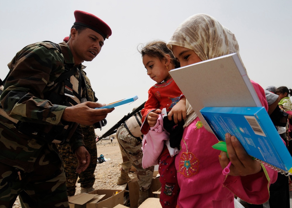 Iraqi children receive toys and school supplies