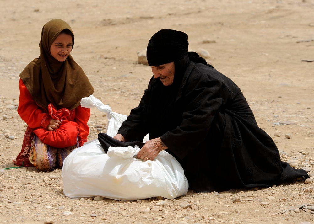 Iraqi children receive toys and school supplies