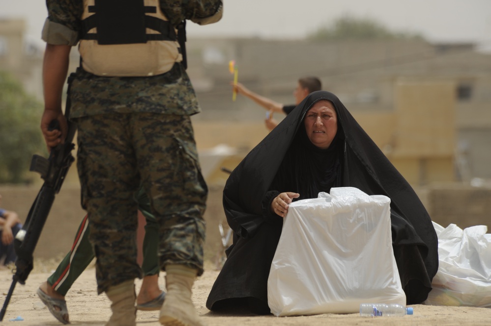 Iraqi children receive toys and school supplies