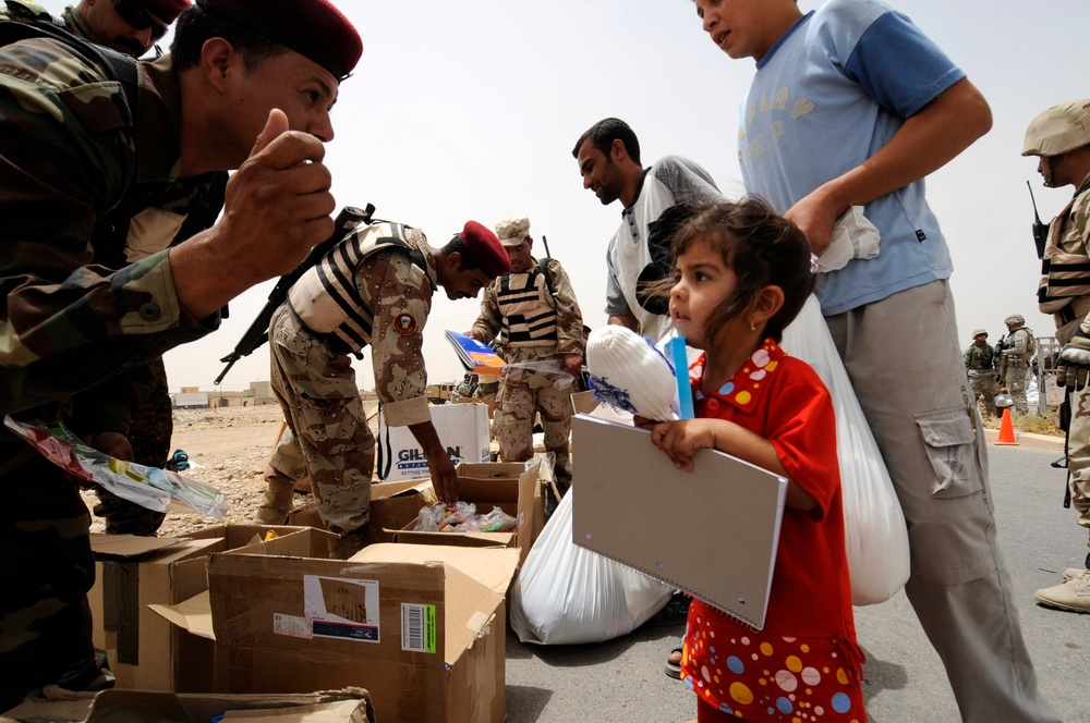 Iraqi children receive toys and school supplies