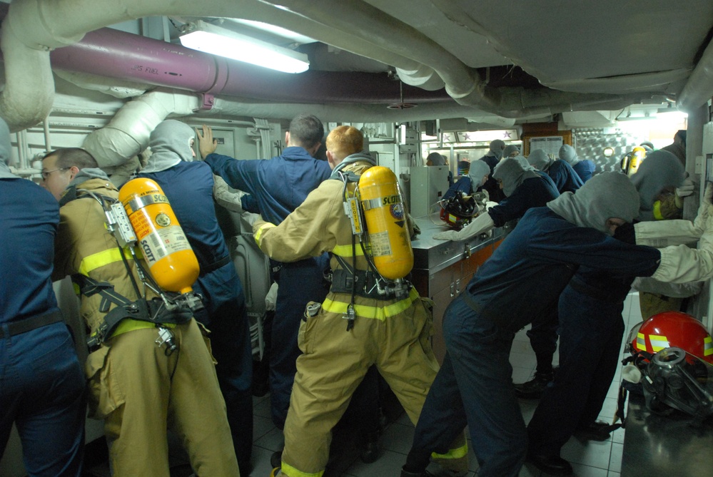 USS Ronald Reagan Sailors practice damage control