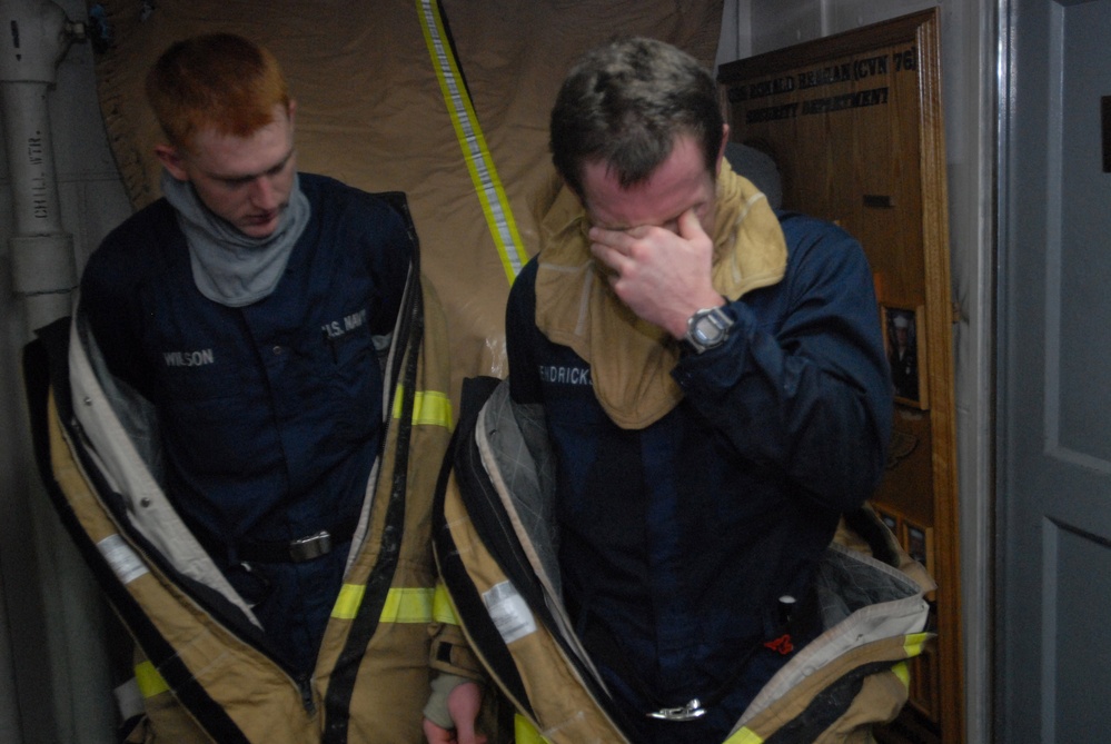 USS Ronald Reagan Sailors practice damage control