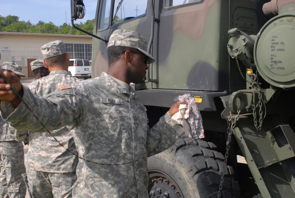 Soldiers Challenge GTMO Terrain During LMTV Training