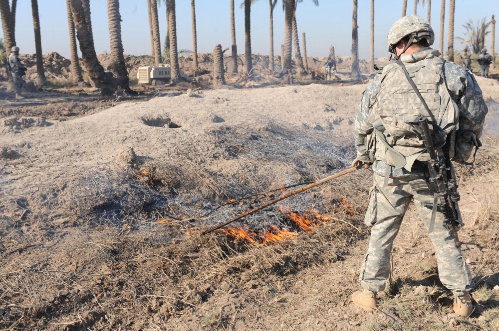 Soldiers conduct controlled burn