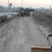 U.S., Iraqi soldiers clear minefield