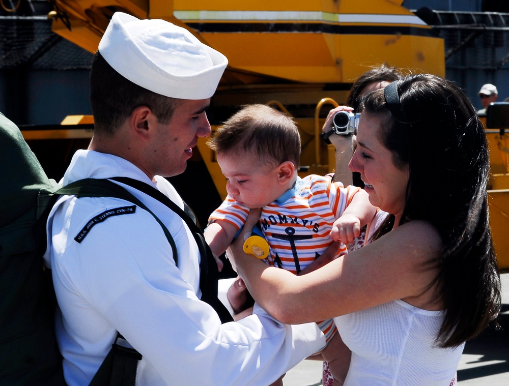 Sailor meets son during port visit
