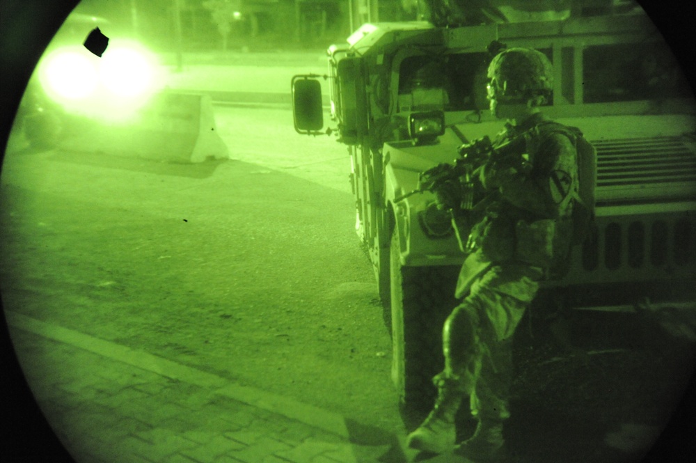 U.S. Soldiers stay in Background