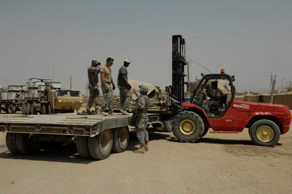 U.S. Soldiers Leave Camp Tarvloski