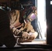 Kuwait-deployed service members dig and weld