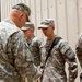 General Odierno Hands Out Coins in Iraq