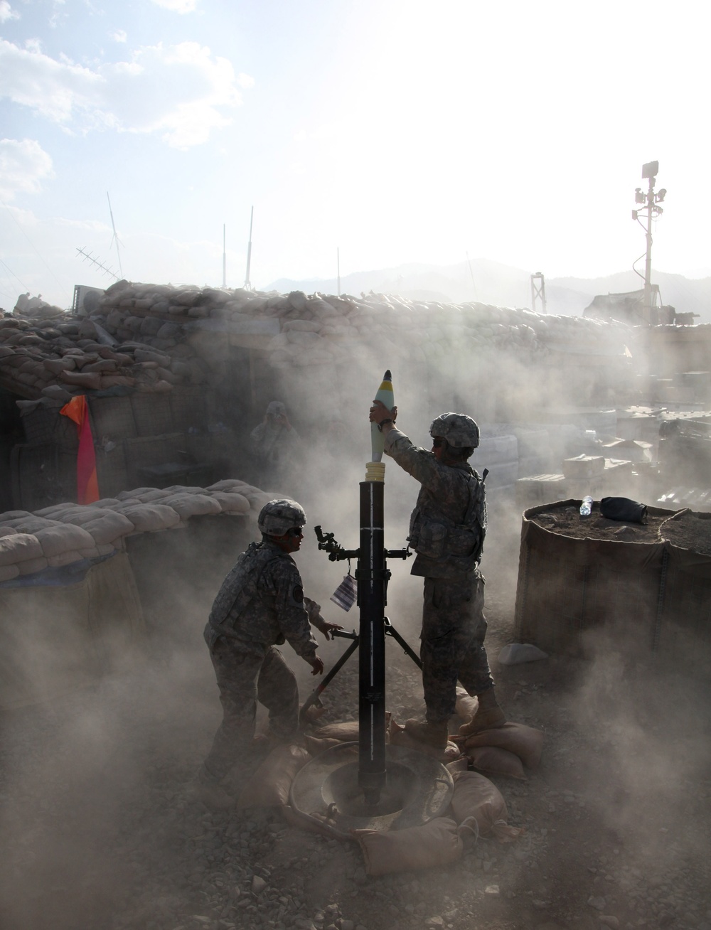 Soldiers Lay Down Mortar Fire in Afghanistan