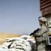 U.S., Iraqi soldiers hand out food