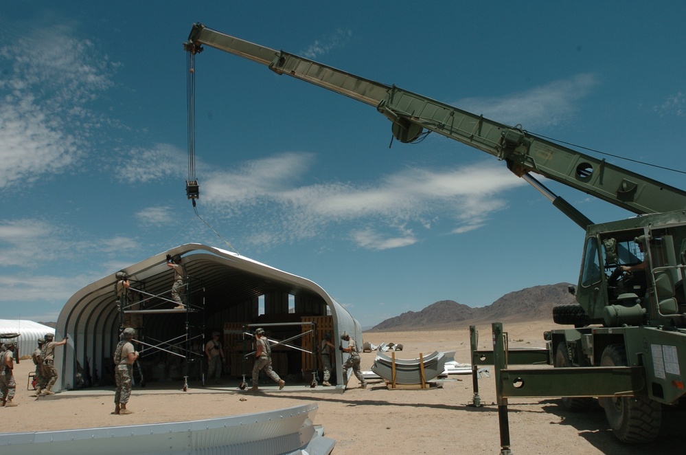 Engineers help repair, build Q Huts during Operation Sand Castle 2009