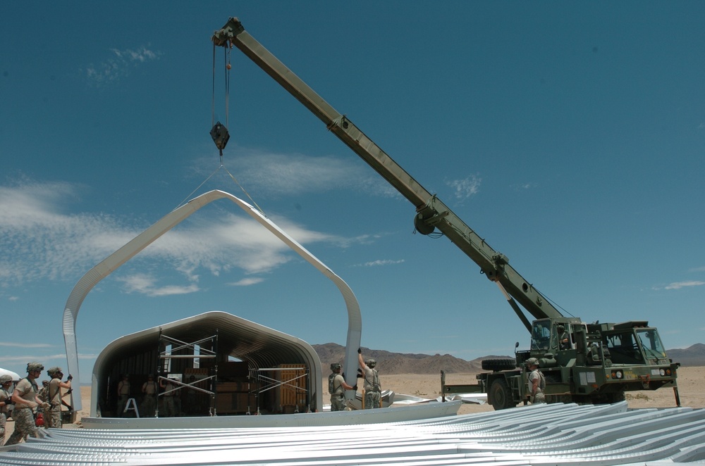 Engineers help repair, build Q Huts during Operation Sand Castle 2009
