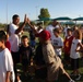 Former Super Bowl champion teaches football to Combat Center kids