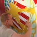 Sabers wield paint brushes