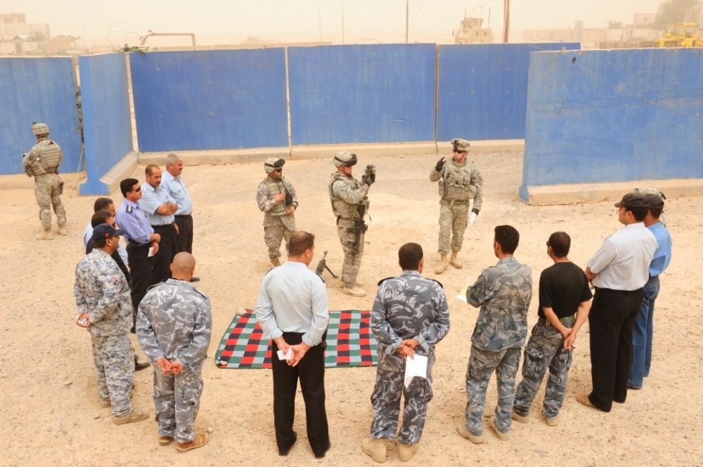 Iraqi police shoot at the range with sites on the future