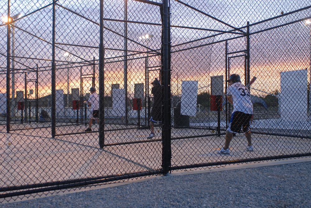 Joint Task Force Guantanamo service members put their batting skills to the test