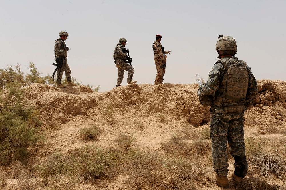 U.S., Iraqi soldiers clear village