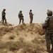 U.S., Iraqi soldiers clear village
