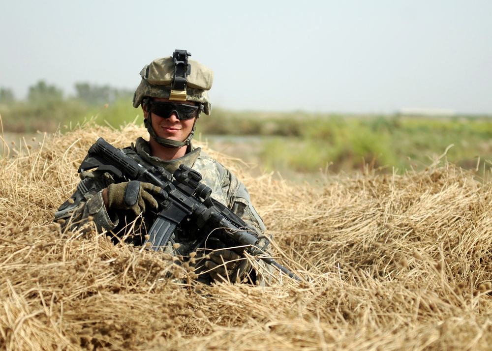 113th Field Artillery Soldiers patrol