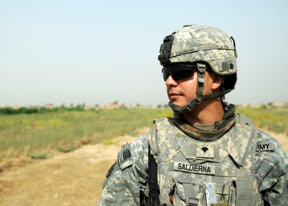 113th Field Artillery Soldiers patrol