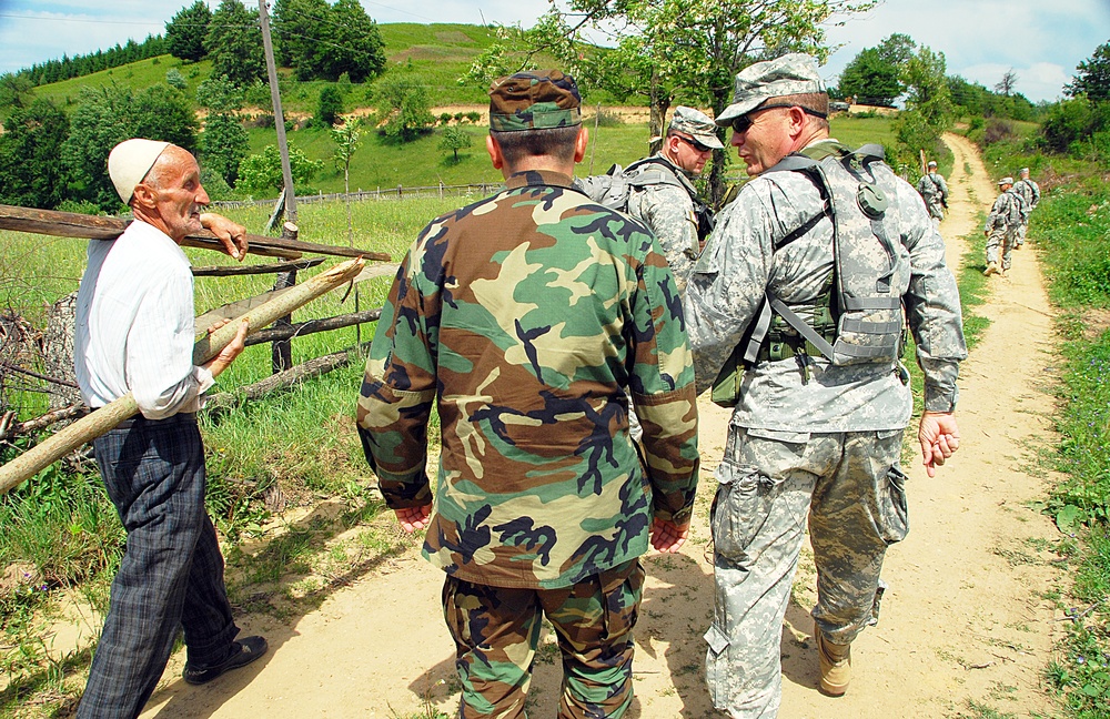 Commander of the California Army National Guard patrols with his troops