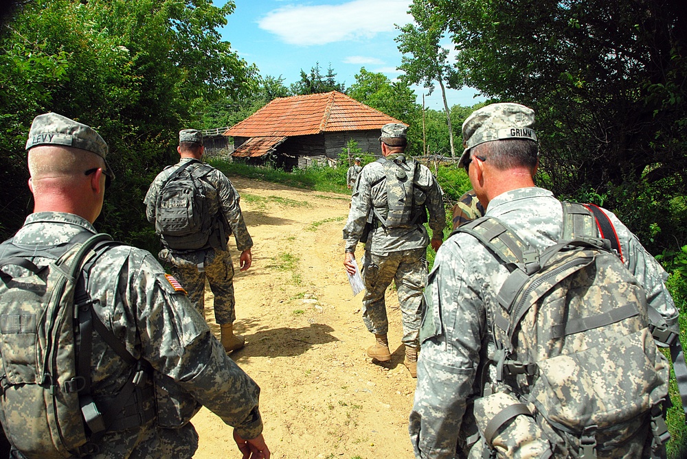 Commander of the California Army National Guard patrols with his troops