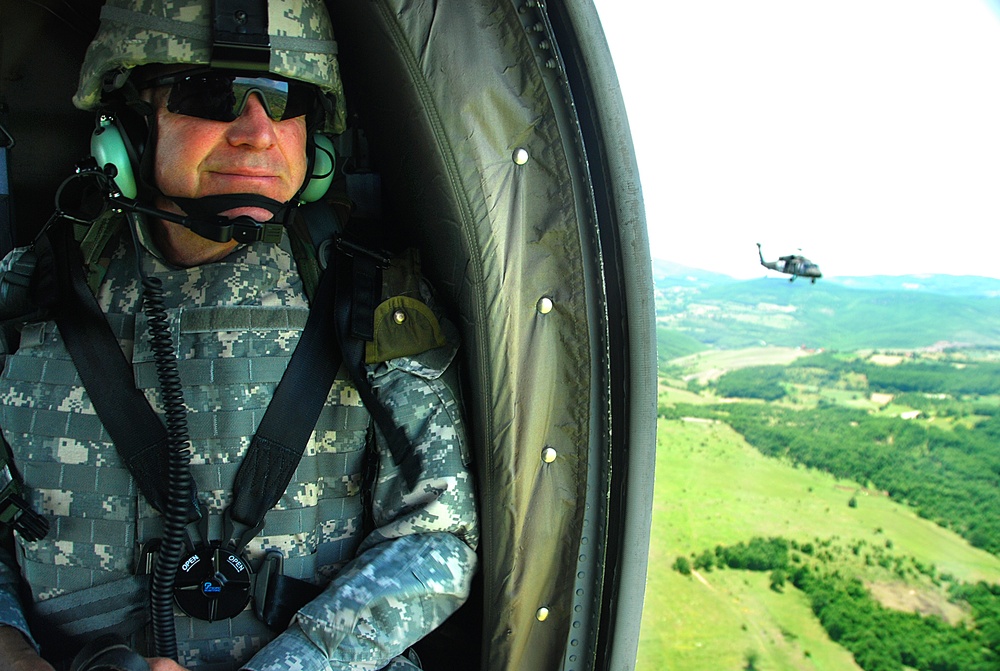 Commander of the California Army National Guard patrols with his troops