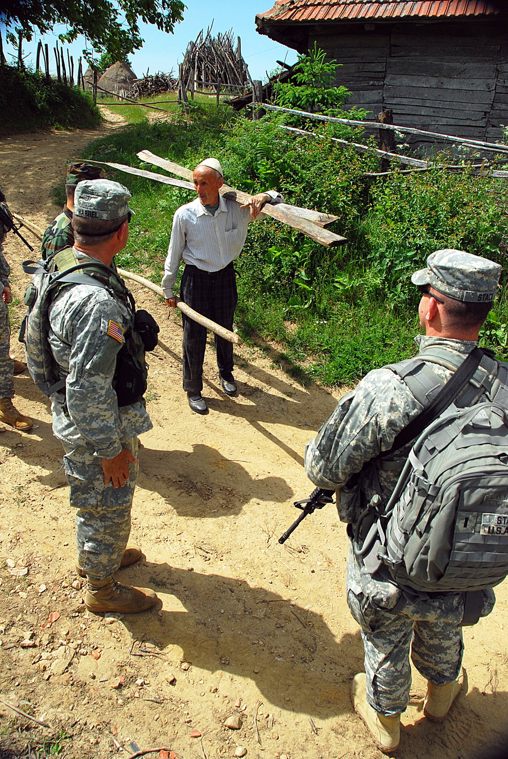 Commander of the California Army National Guard patrols with his troops