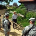 Commander of the California Army National Guard patrols with his troops