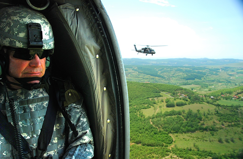 Commander of the California Army National Guard patrols with his troops