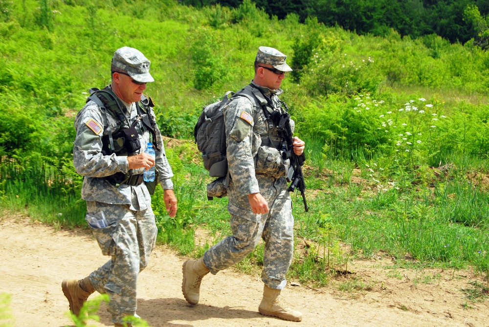 Commander of the California Army National Guard patrols with his troops