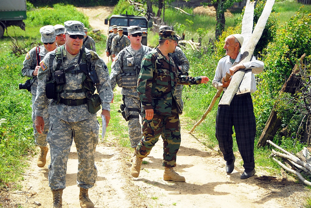 Commander of the California Army National Guard patrols with his troops