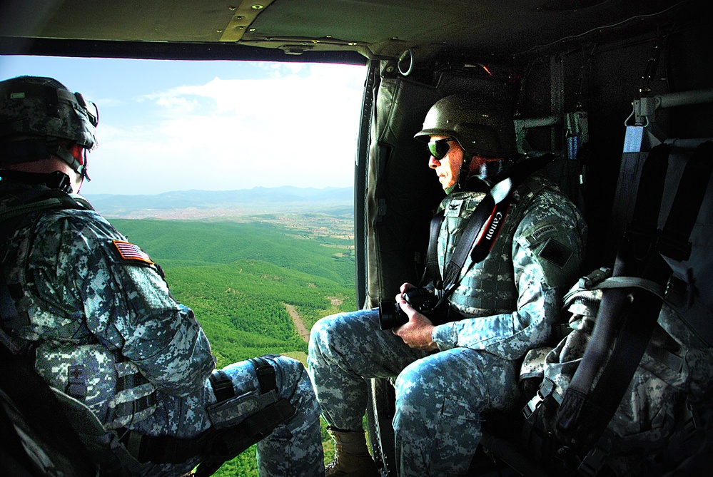 Commander of the California Army National Guard patrols with his troops