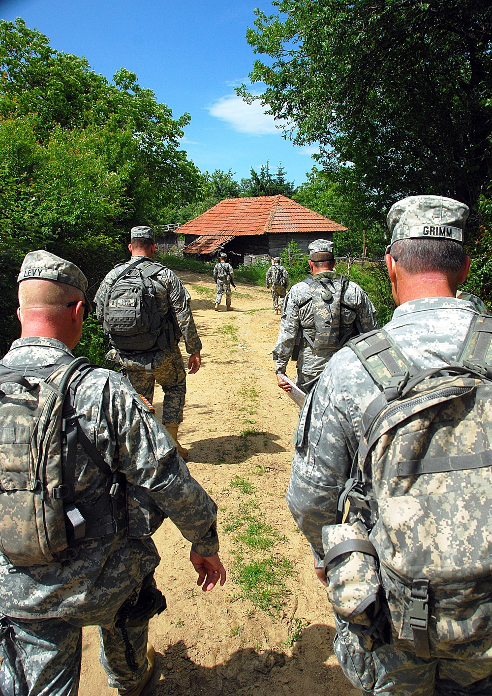 Commander of the California Army National Guard patrols with his troops