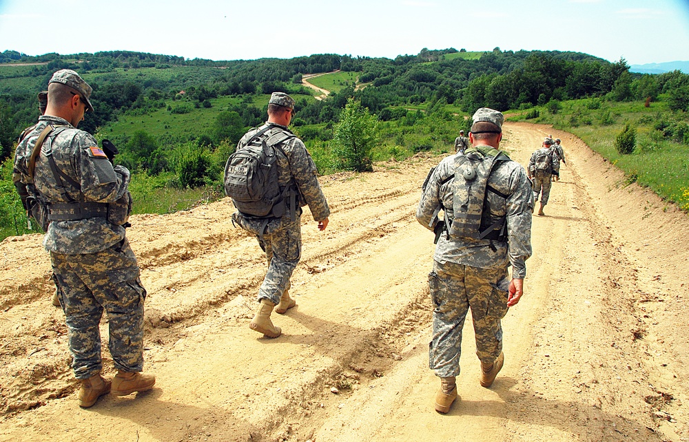 Commander of the California Army National Guard patrols with his troops