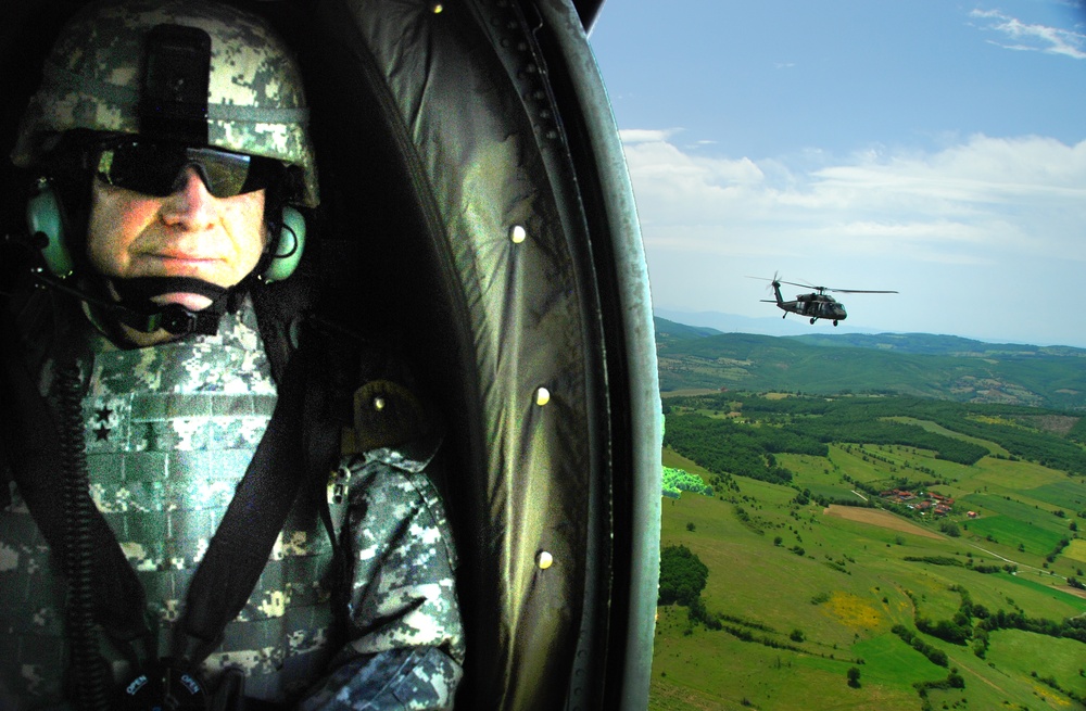 Commander of the California Army National Guard patrols with his troops