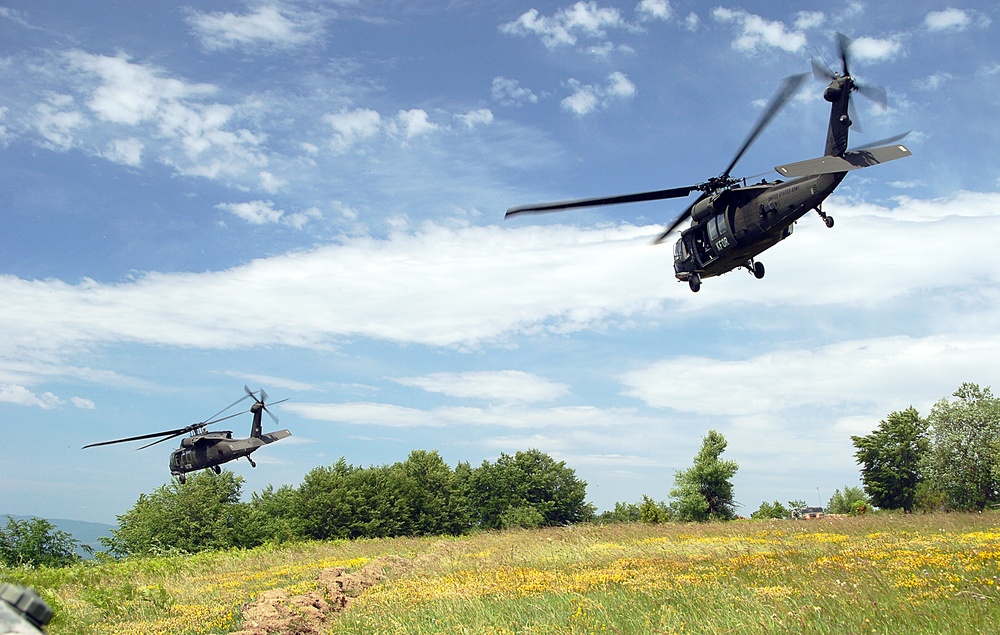 Commander of the California Army National Guard patrols with his troops