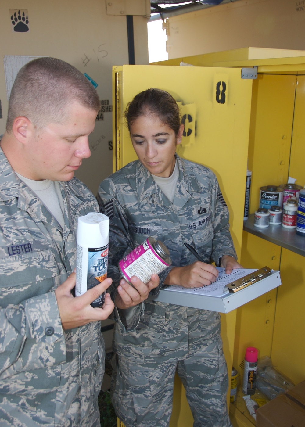 Airmen inspect for hazardous waste