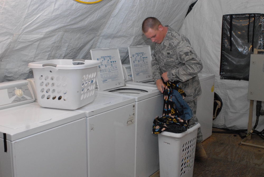 Airman washes clothes