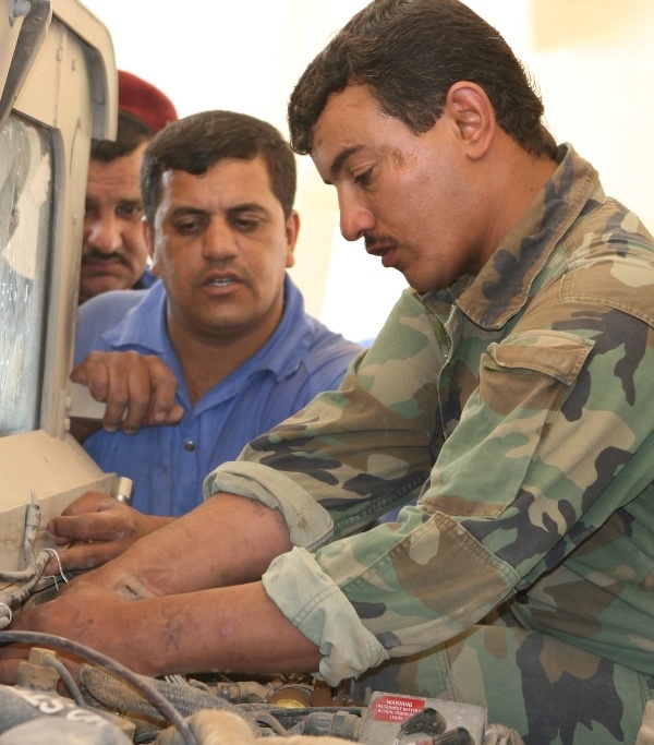 Marine helps transition team train Iraqi army in vehicle maintenance