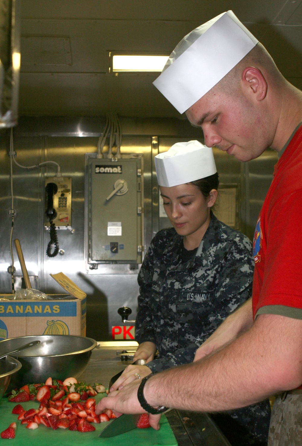 22nd MEU Marines work aboard USS Bataan